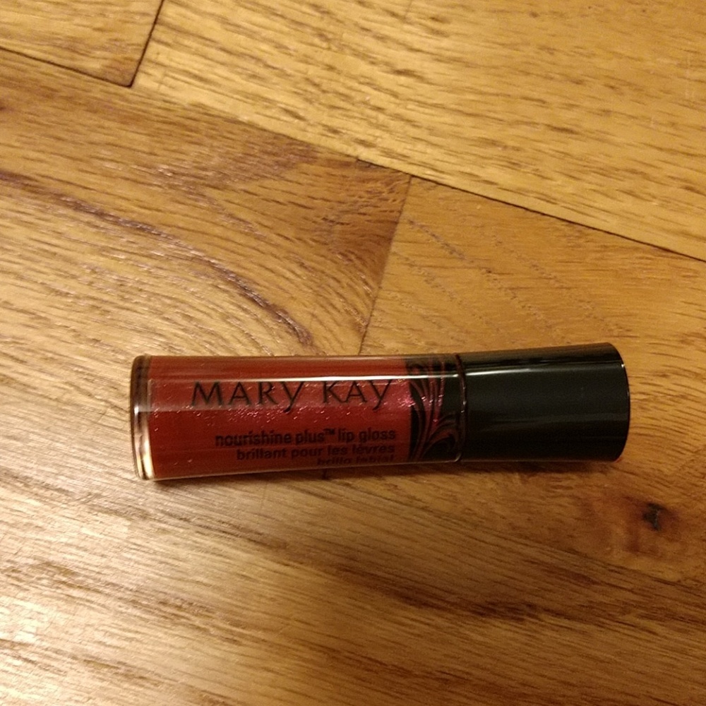 Sparkle berry nourishine plus lip gloss